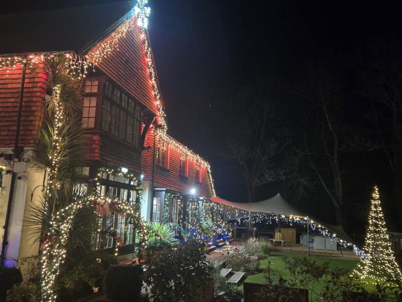 Christmas lights switch on at Tottington Manor near Brighton, Sussex