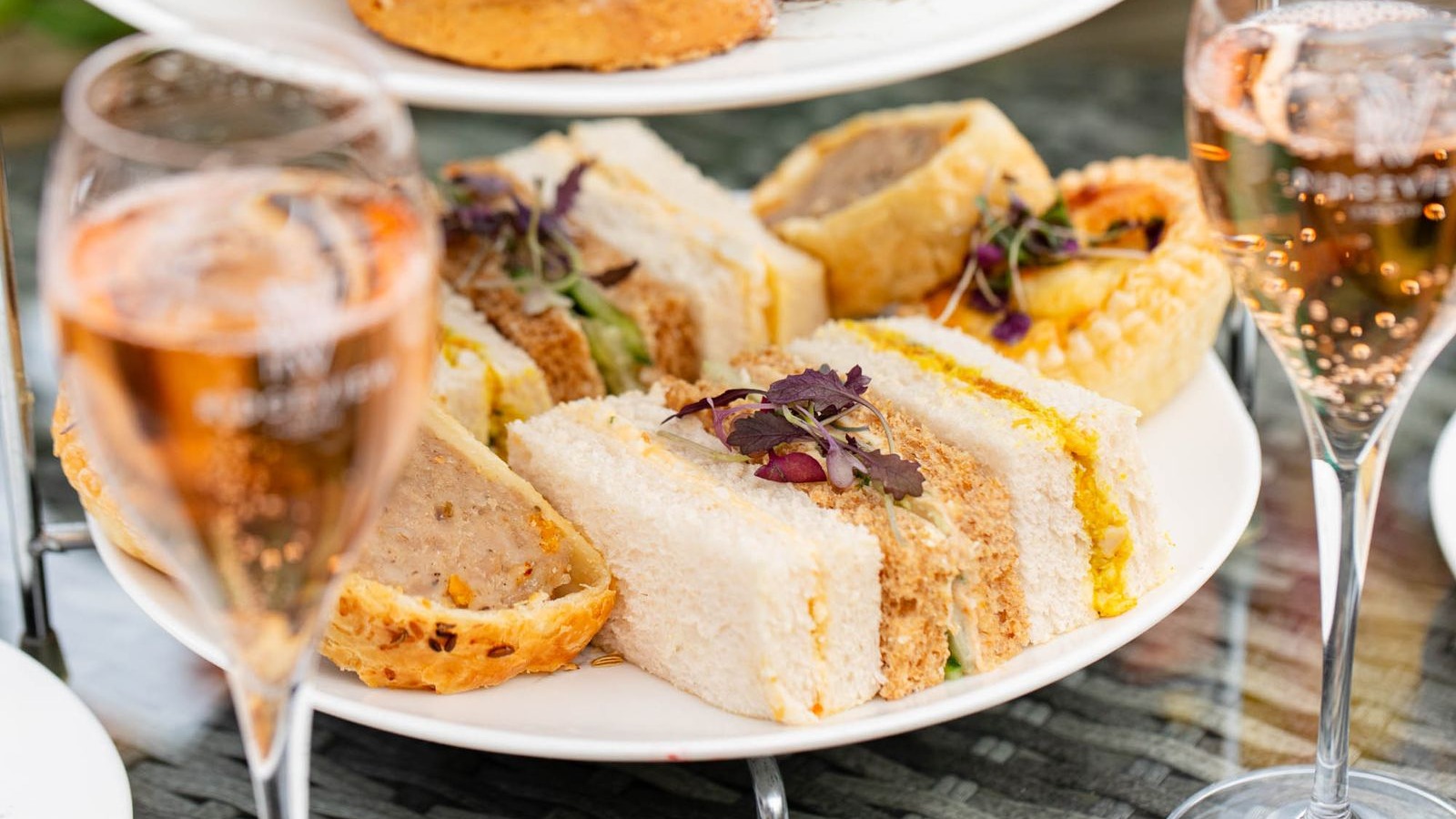 Freshly prepared finger sandwiches and savouries served as afternoon tea at Tottington Manor in West Sussex