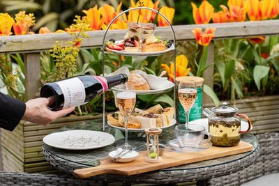 Afternoon tea with Sussex sparkling wine for a celebration of life at Tottington Manor