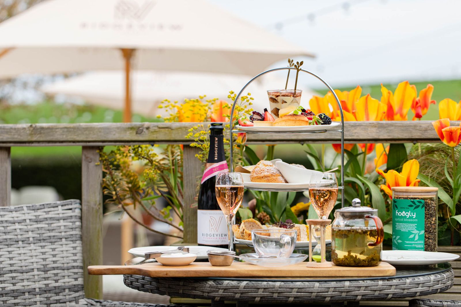 Afternoon tea on the terrace during a Sussex board retreat at Tottington Manor